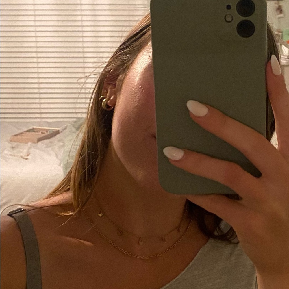 Gold butterfly necklace stack